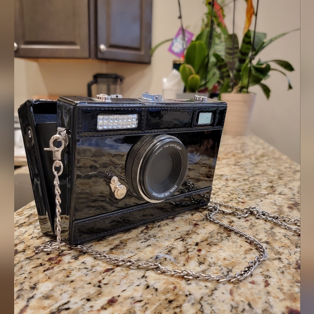 Bag/clutch in the form of a photocame